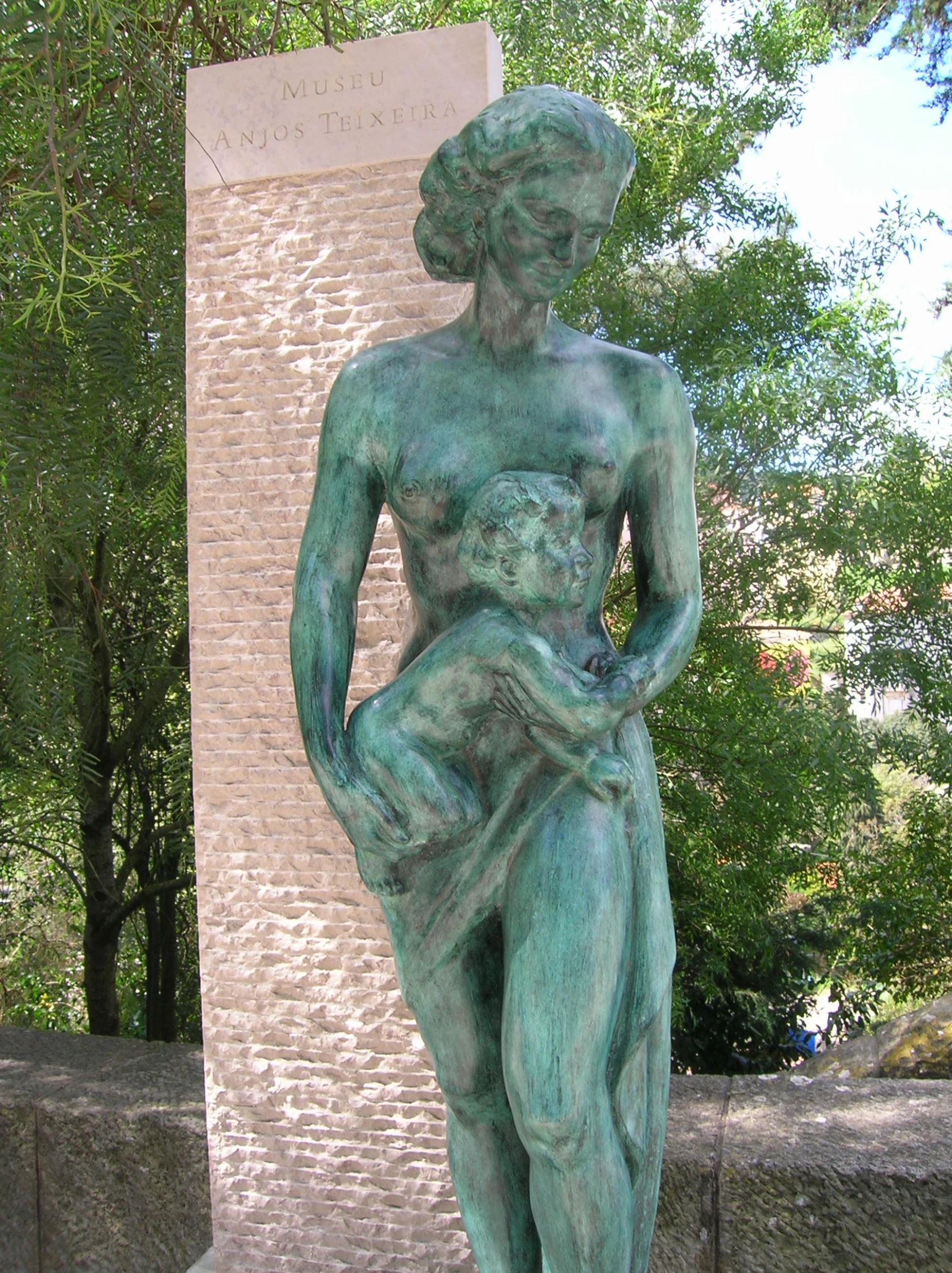 a statue is shown near the monument