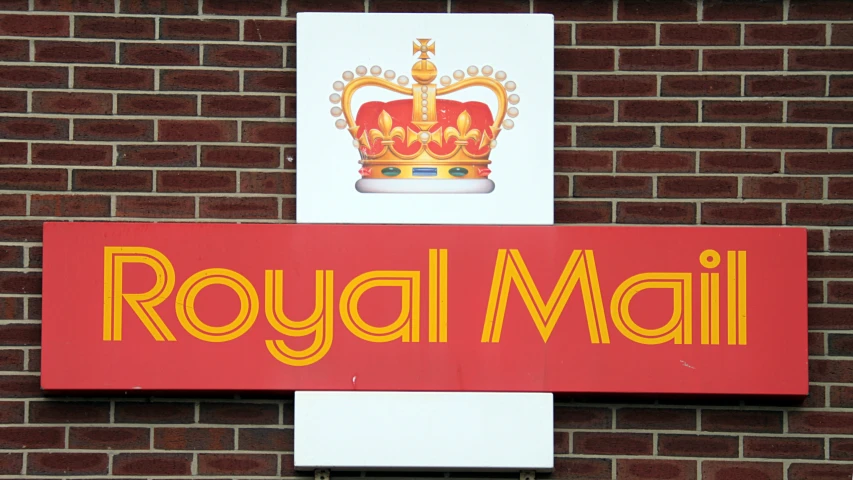 a picture of the royal mail on the side of the building