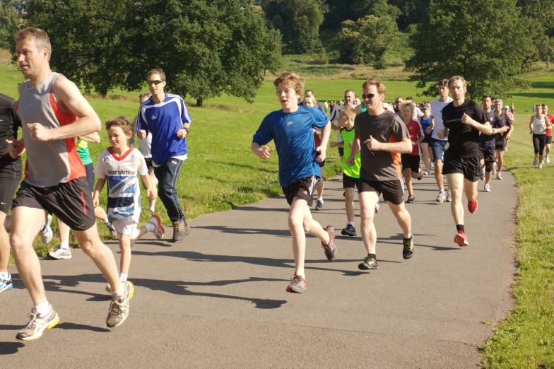 the runners are competing on the street together