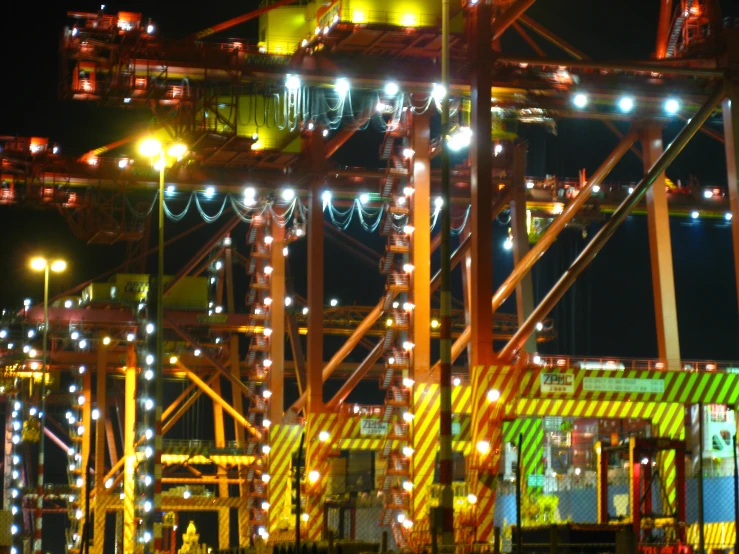 lots of lights and a lot of containers at night