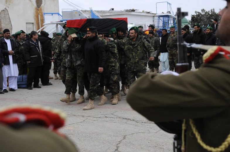 a group of military officers and some people