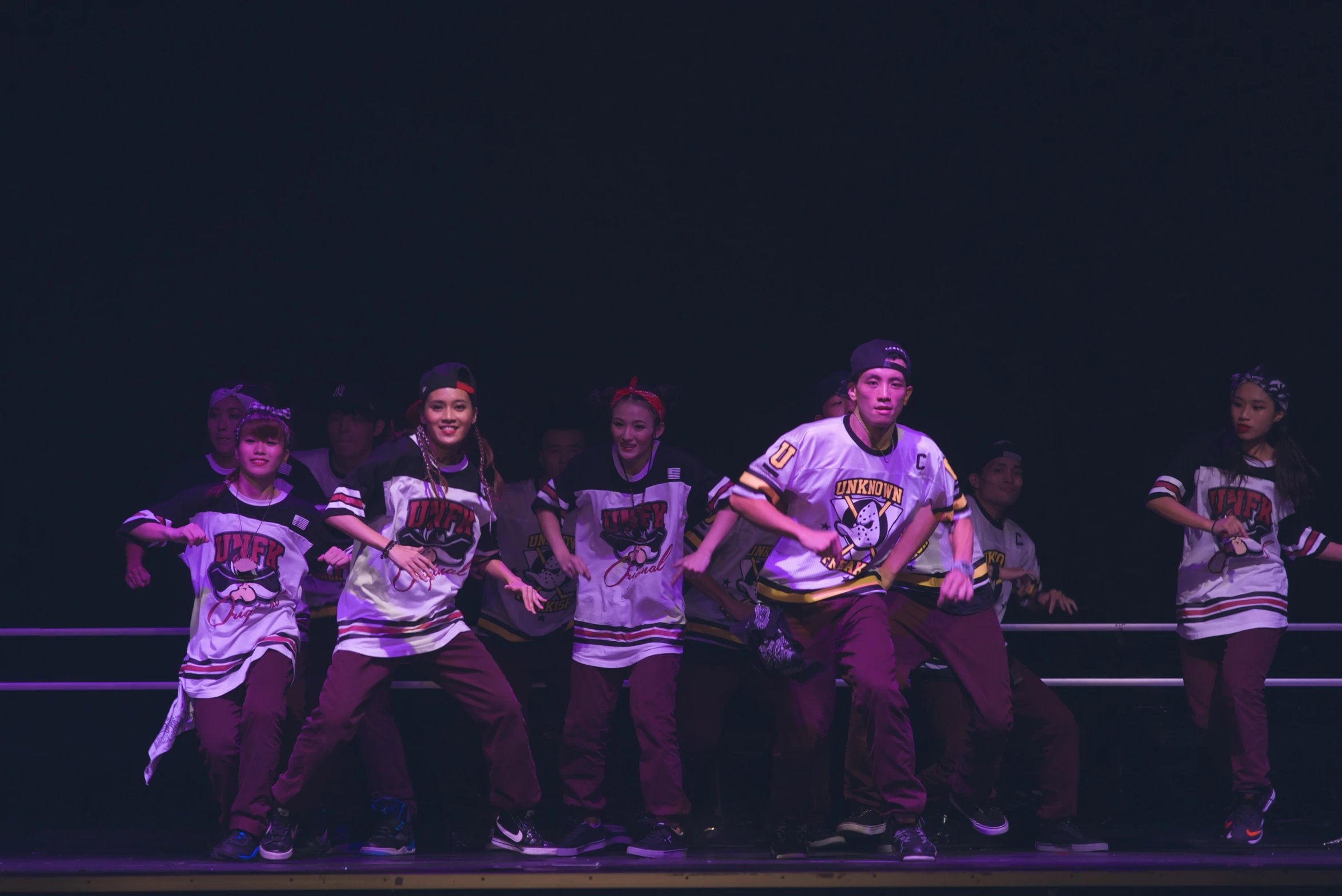 boys and girls performing a musical on stage