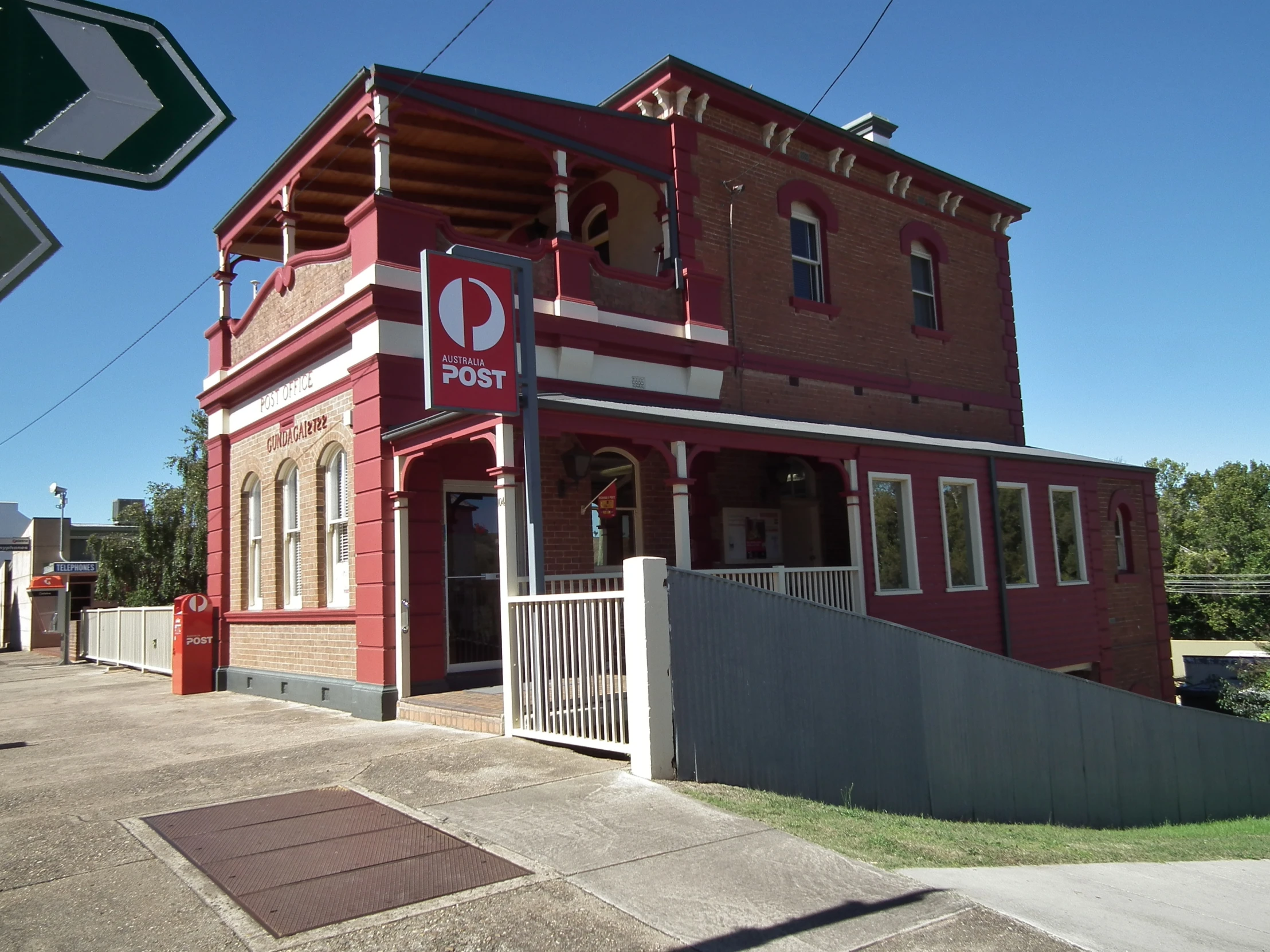 this building is on the corner with no parking signs on it