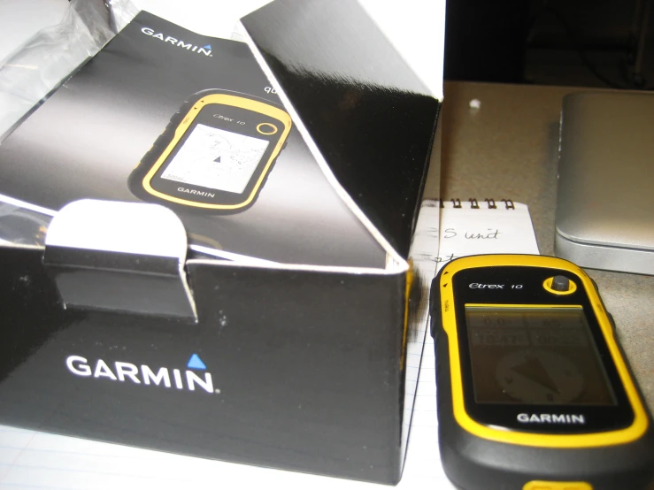 the yellow and black garmin phone is on display