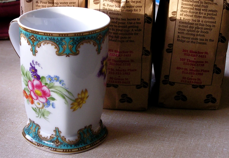 some old porcelain vases in front of books