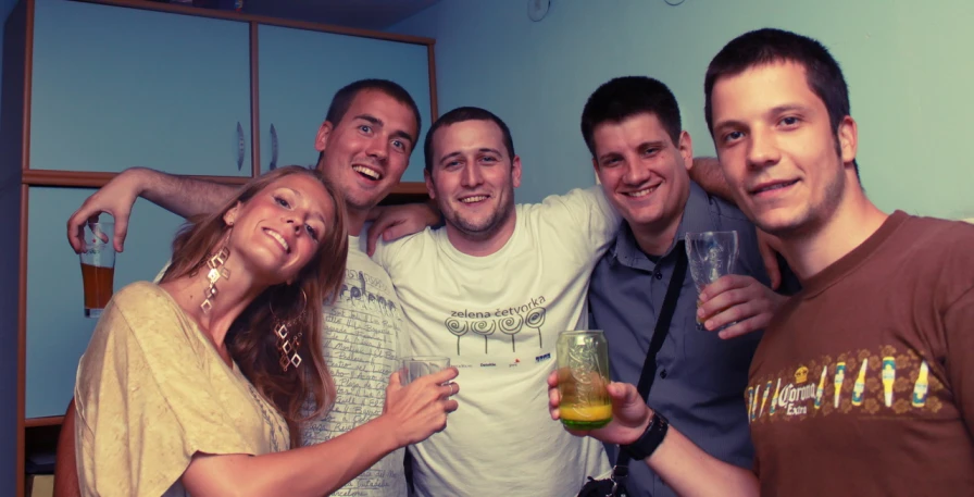 group of friends having fun and enjoying cocktails