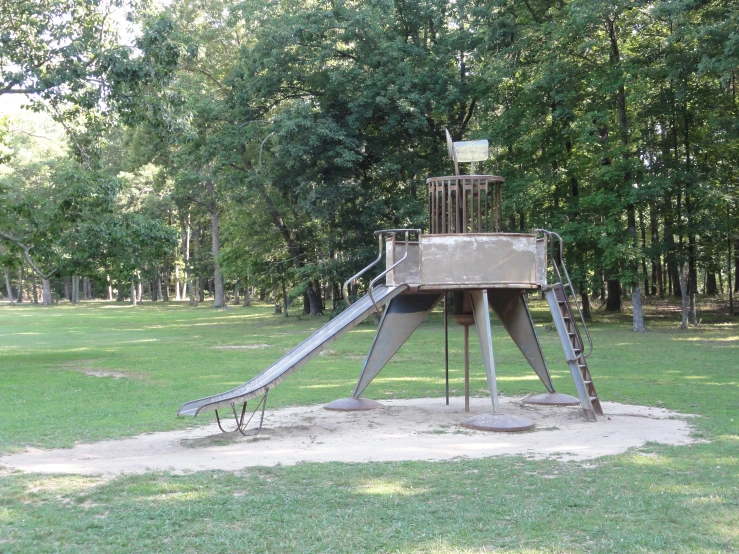 a playground set with slides and climbing towers