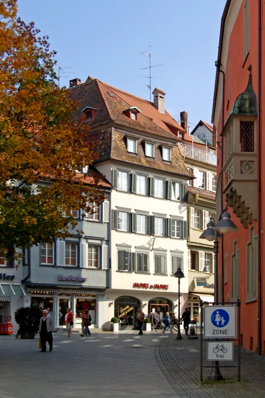 the colorful buildings of the town are by itself