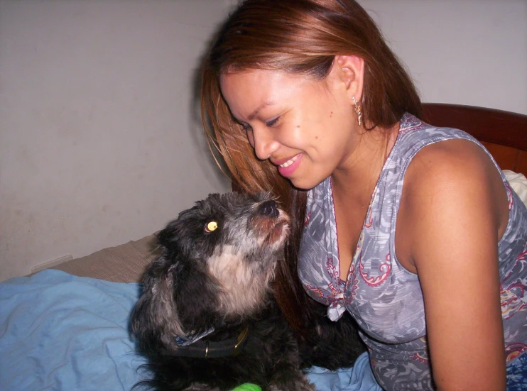 a woman and her dog enjoying the moment