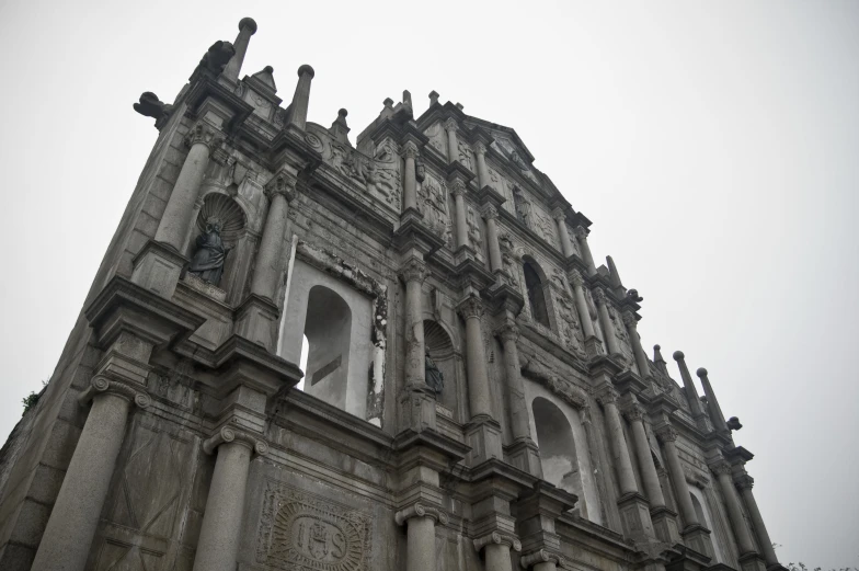 the tall church tower is near the top of the building