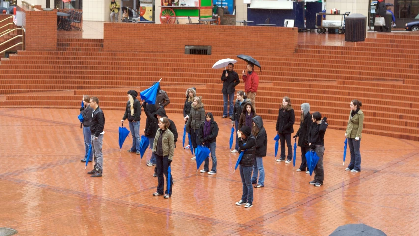 a group of people standing next to each other