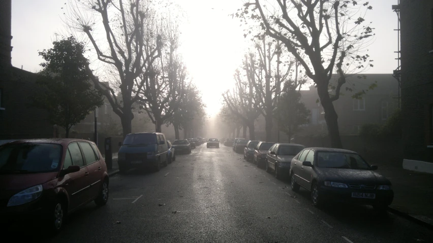 an image of a car passing by the sun