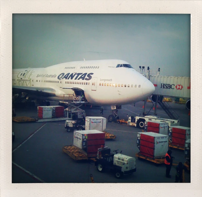 a large commercial plane sitting on top of an airport tarmac