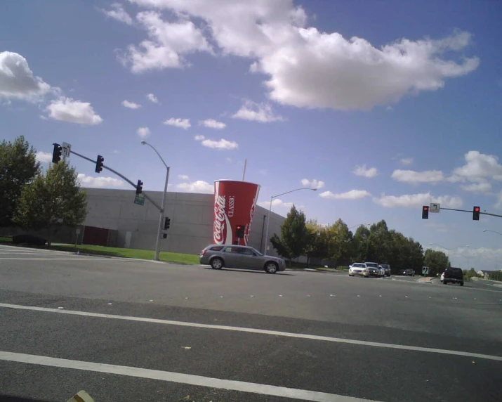 a very strange looking building by the road