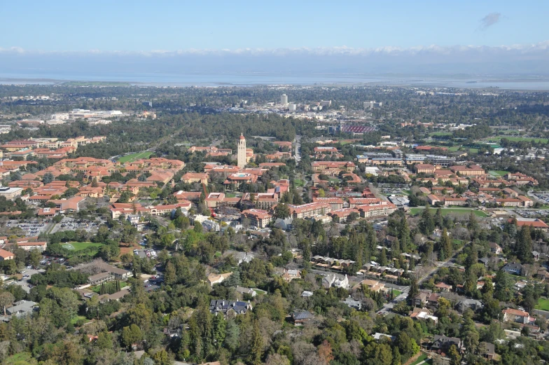 aerial view of a city area with trees and buildings