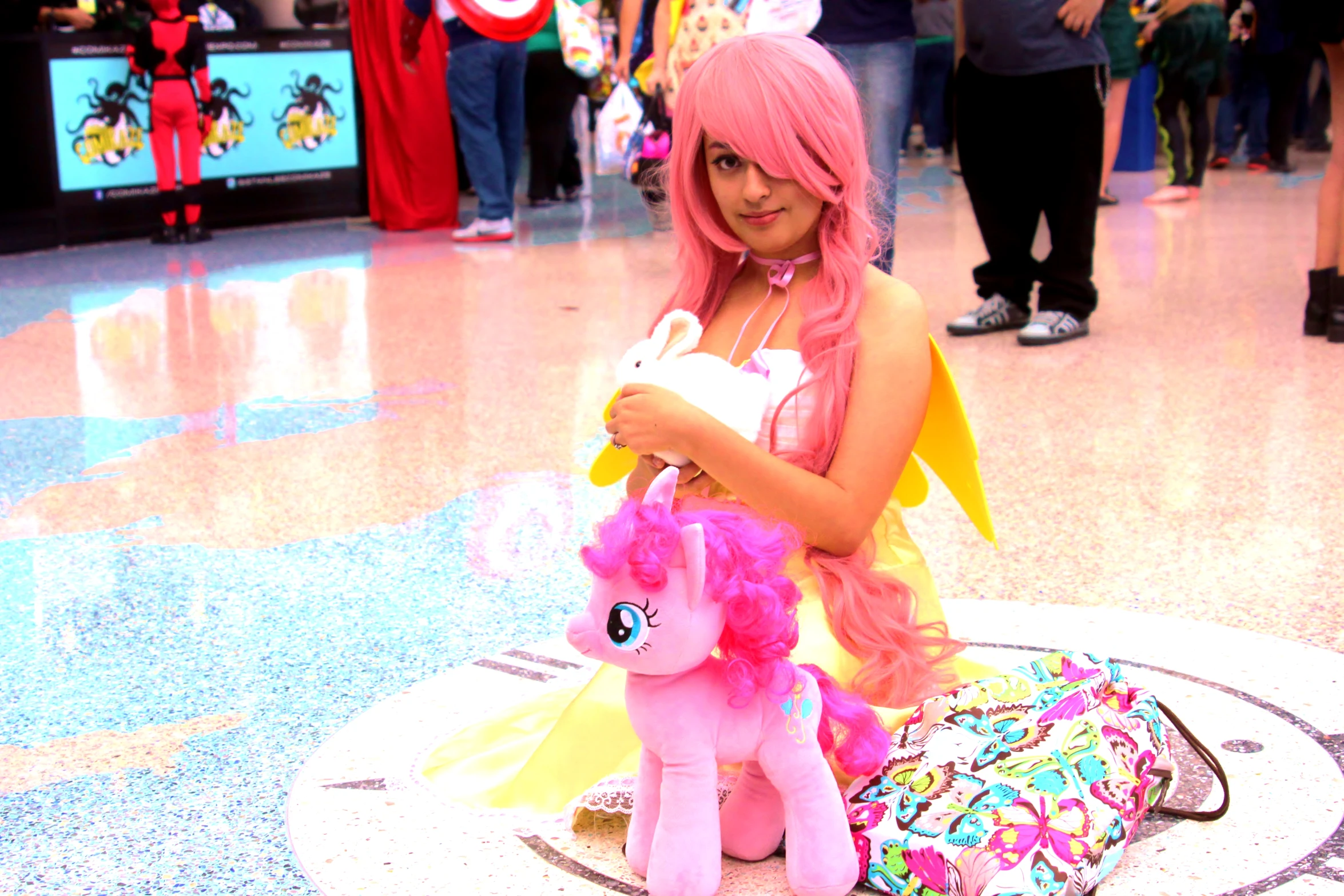 there is a pink pony on the floor