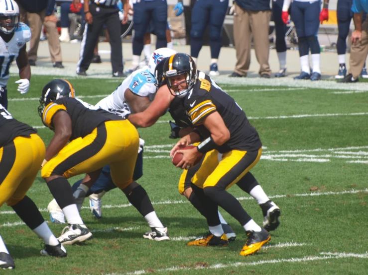 a football game with the players getting ready to take a break