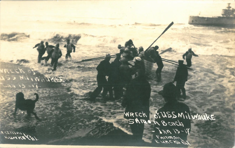 some old people with long sticks standing in the water