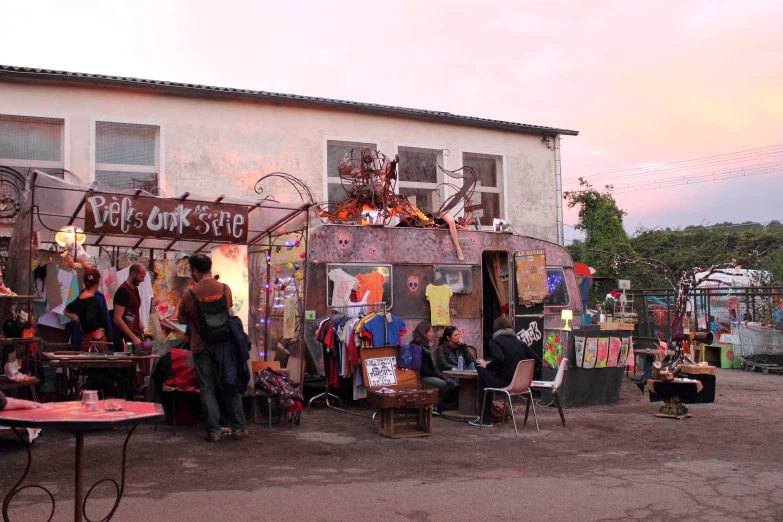 a market with many different objects and people