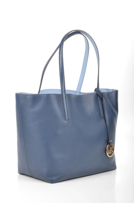 blue tote with a golden key