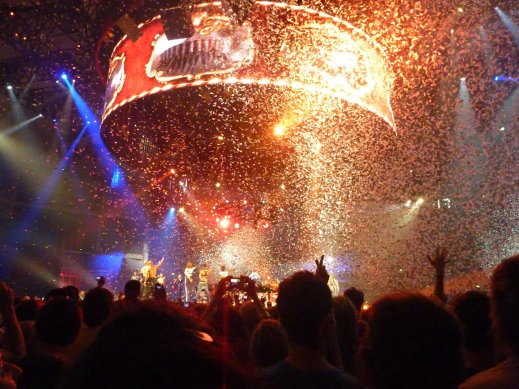 the crowd is watching the performers on stage