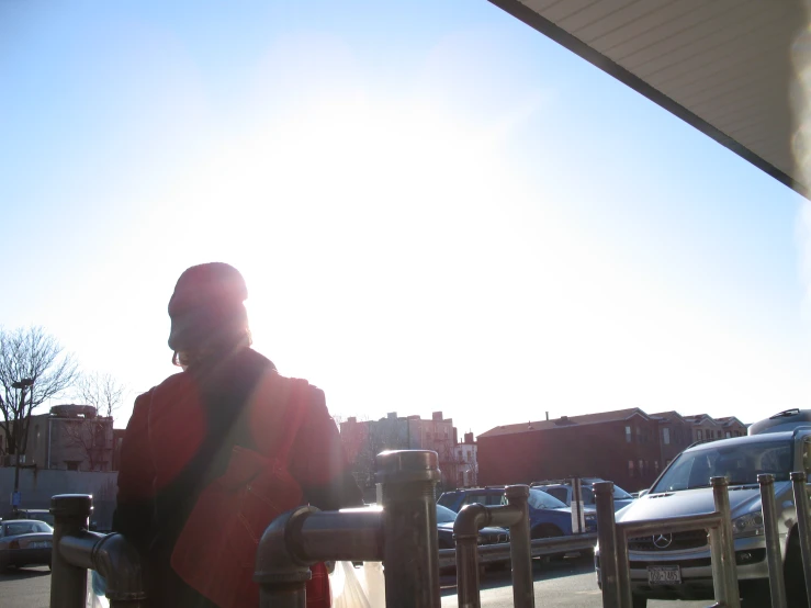 a person standing in front of a fire hydrant