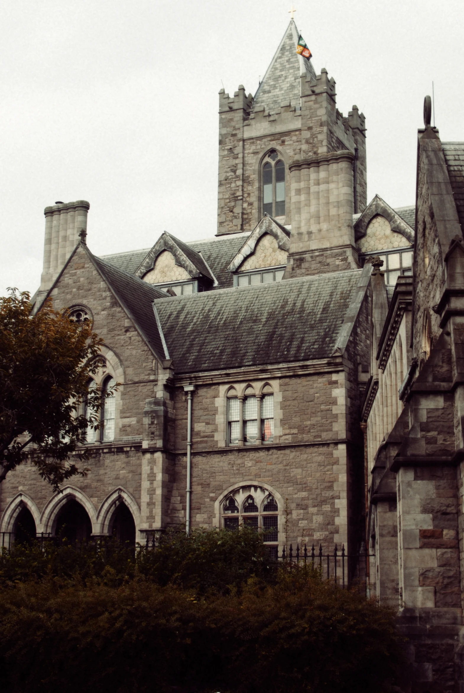 the building has many windows and spires