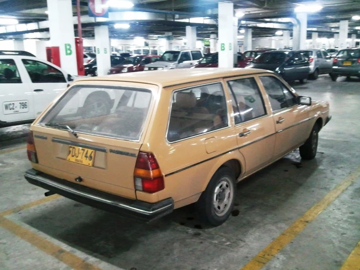 this is a picture of a parking garage with vehicles