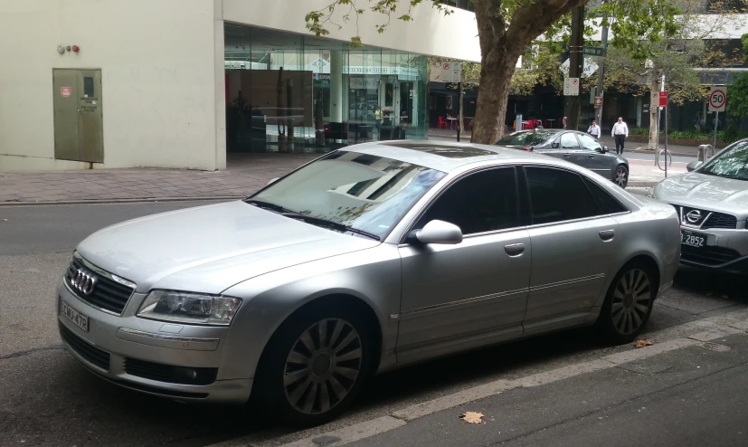 an image of a parked car on the side of a street