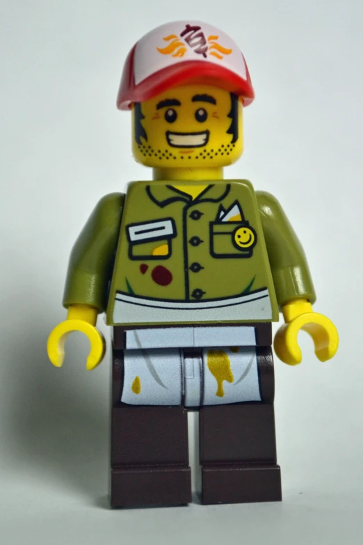 lego man in a fireman's uniform with yellow and red hair