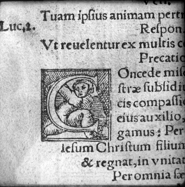 a page from an old mcript containing a religious figure