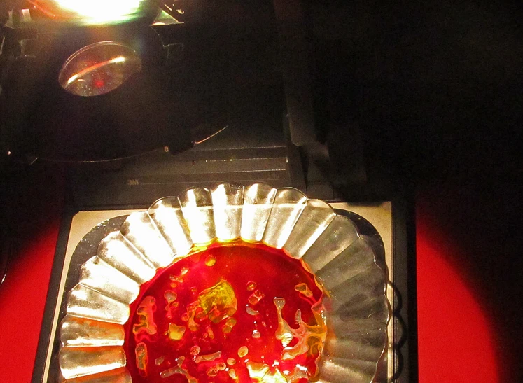 a pizza sitting on top of a glass plate