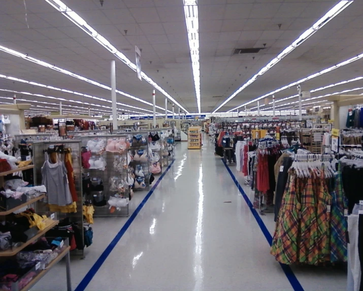 a store with many items and clothes on display