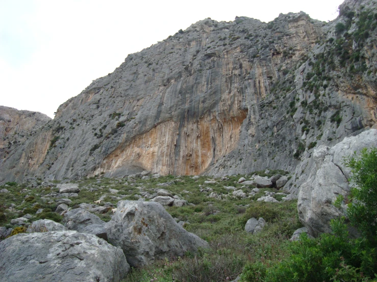 the area near a big mountain with rock formations