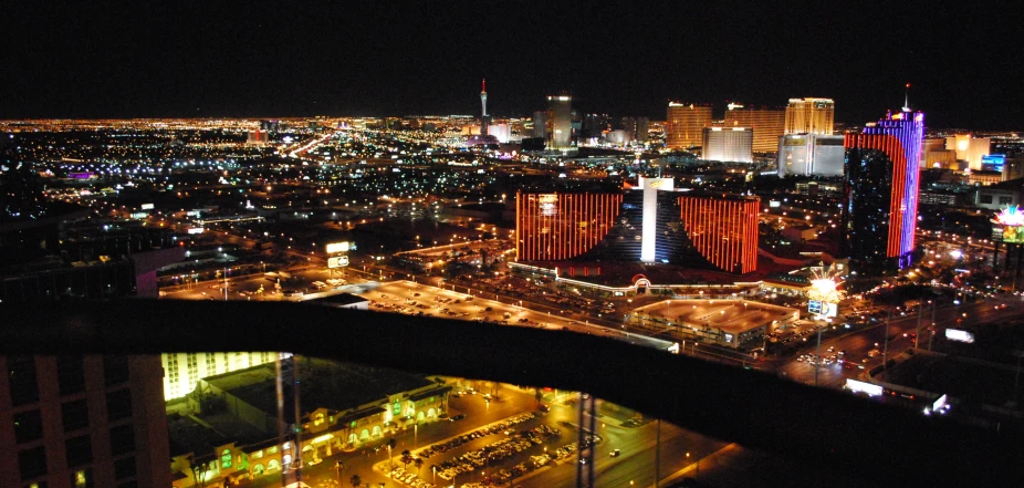 a po of cityscape at night from an urban rooftop