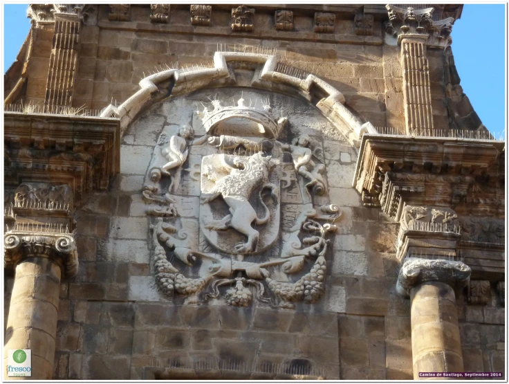 the emblem of the castle has elaborate carvings on it