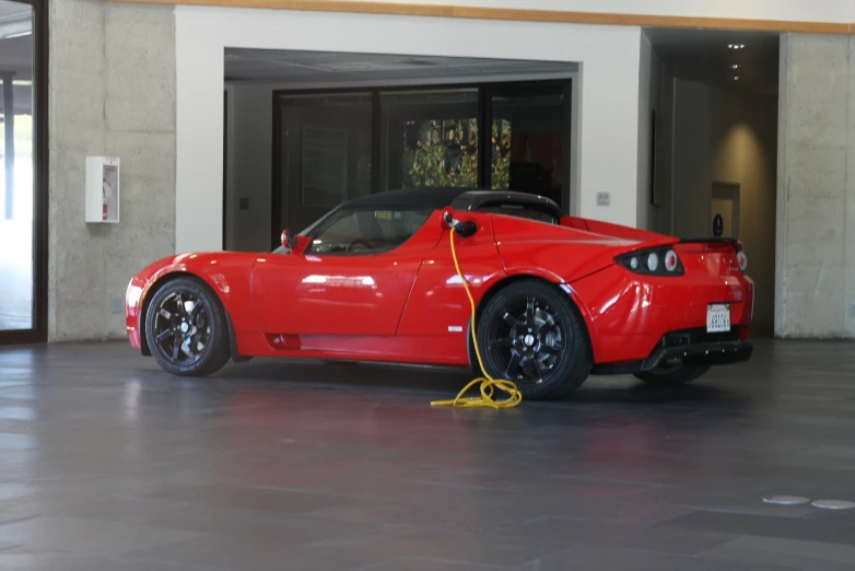 an electric car in the lobby of a el