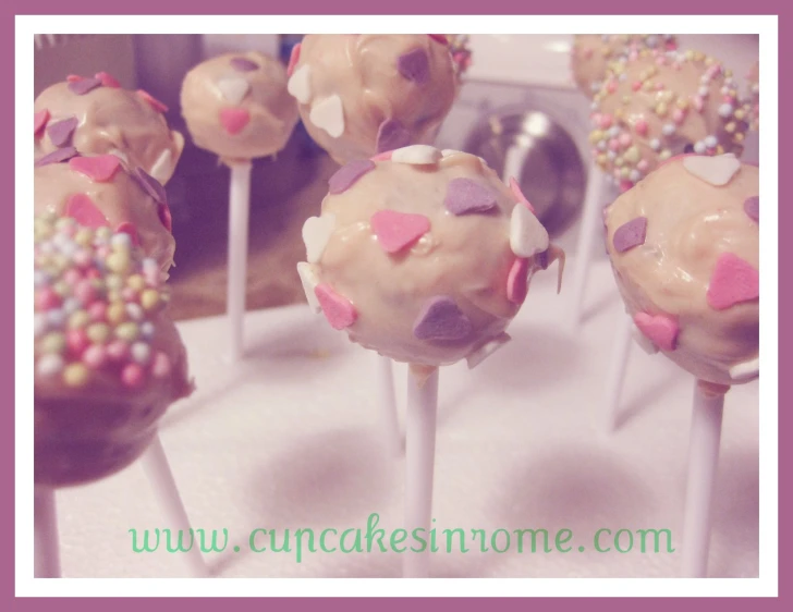 chocolate cake pops decorated with sprinkles and sprinkles