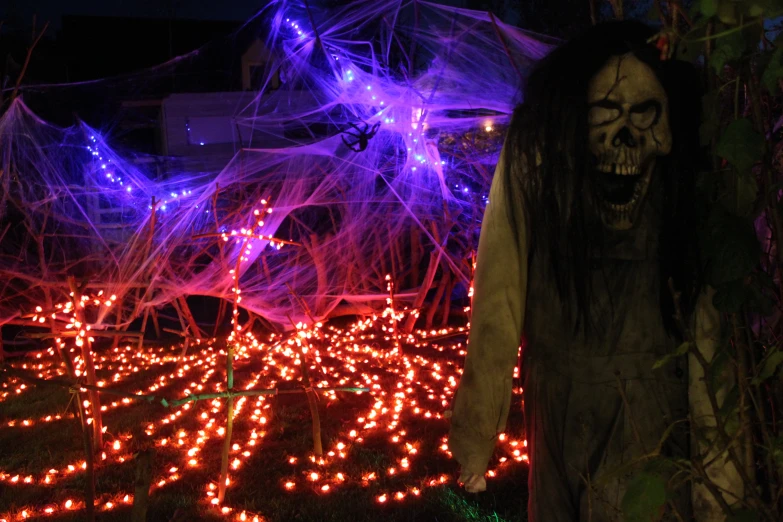 a person dressed up in costume standing outside