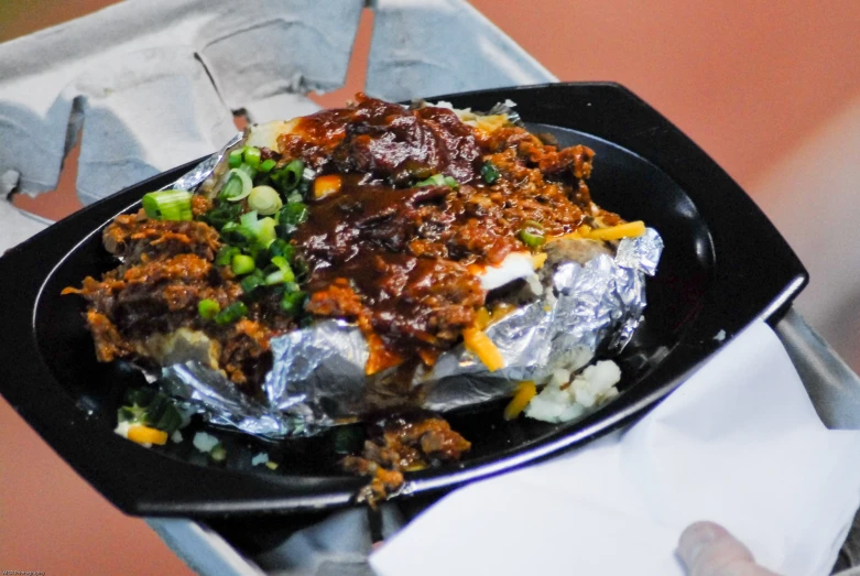 an image of food on a black plate