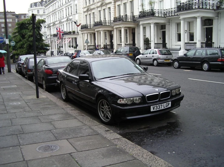 a few cars parked on the side of the street