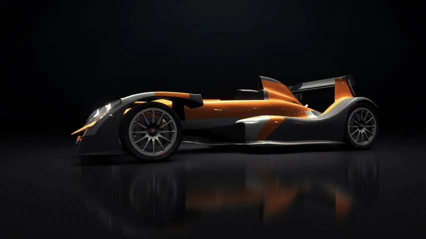 an orange and white race car on a black background