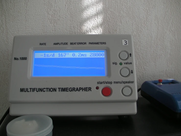 the white lcd display on a machine displays an important time