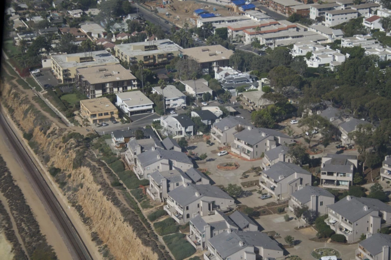 the aerial view of some houses with an overhead view of them