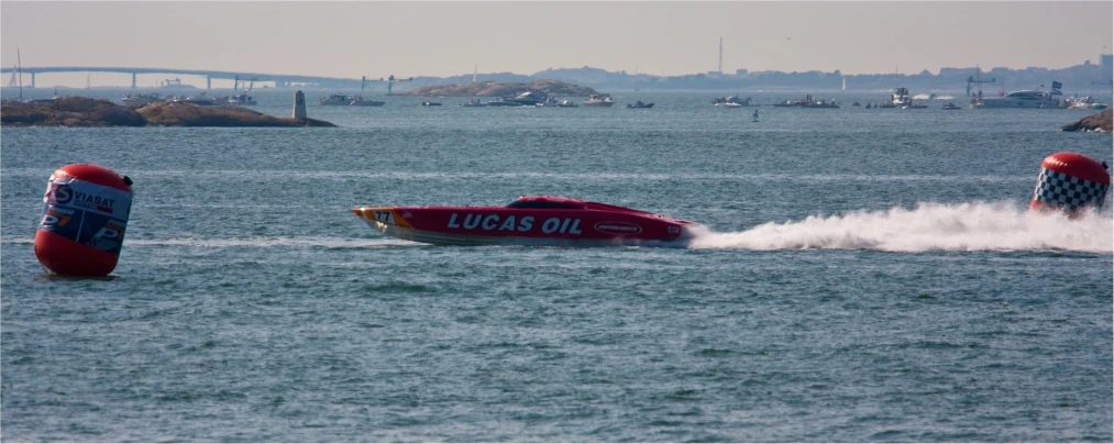 two inflatable boats speeding across a body of water