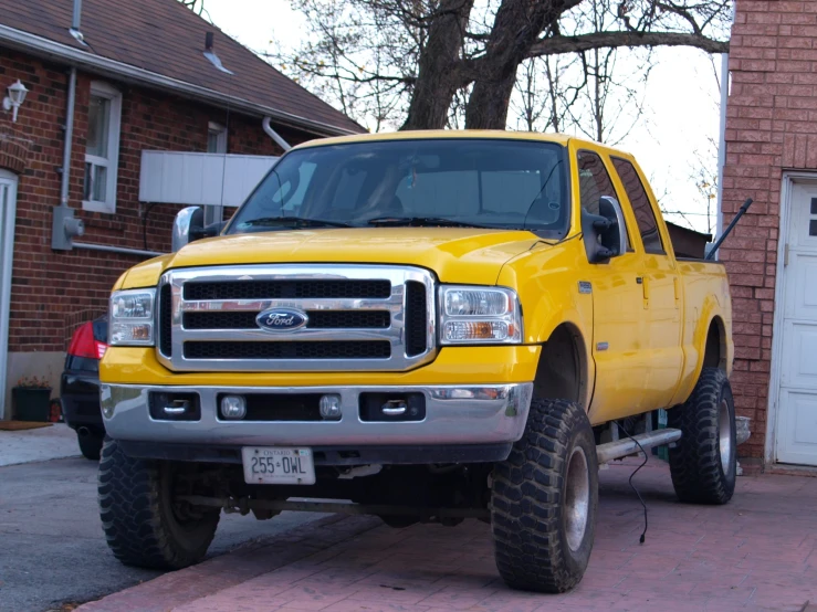 there is a truck that has been parked in the driveway