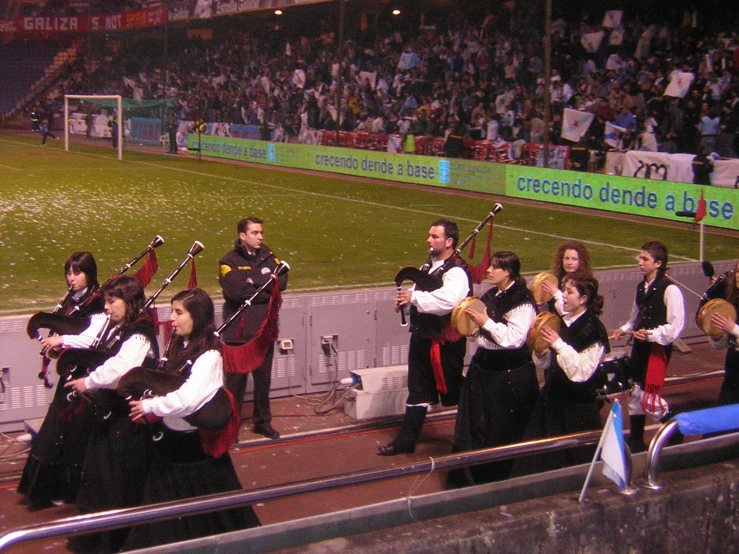 a band of people that are playing some musical instruments