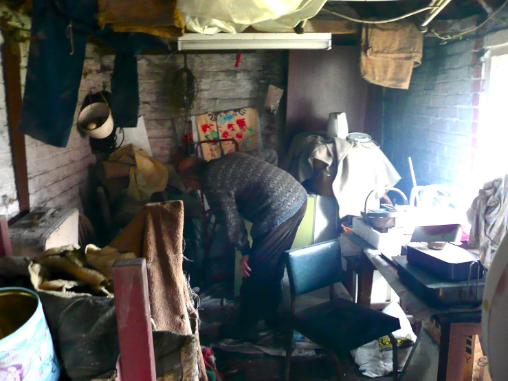 a room with a large pile of stuff on the floor