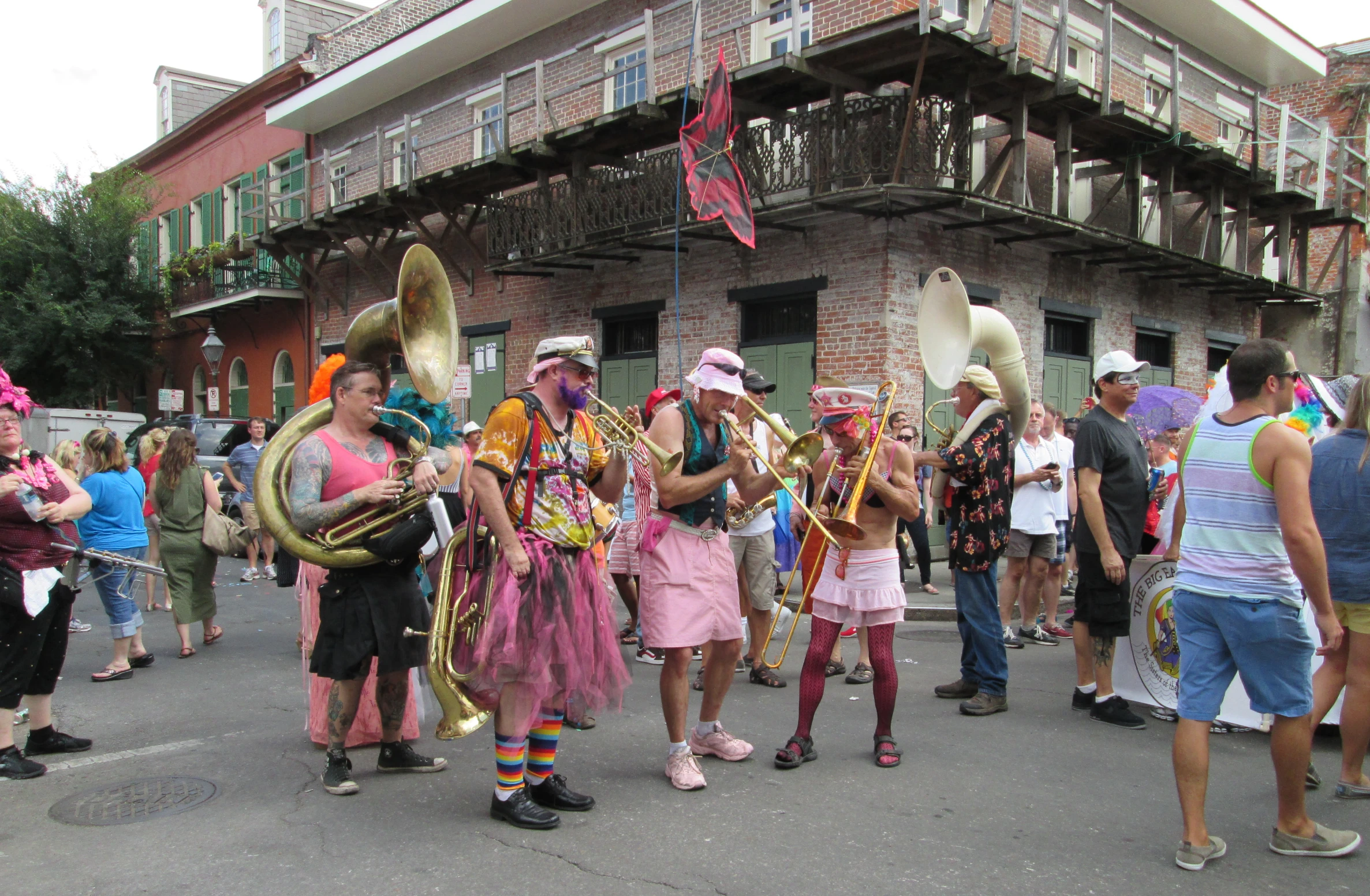 people with music instruments are gathered in the street