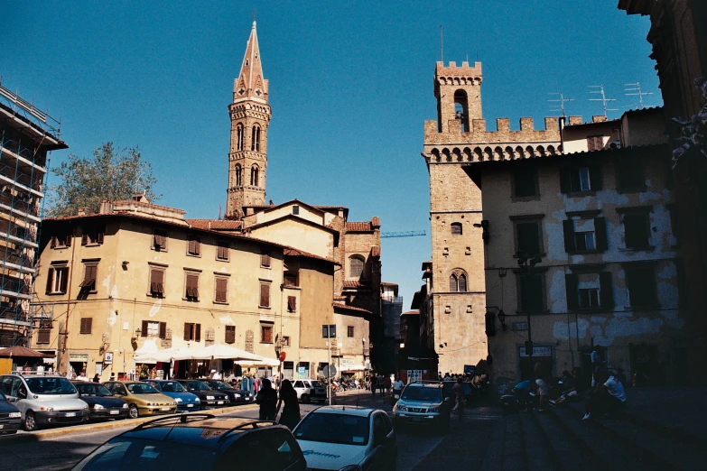 view from an outside city street with cars and buildings